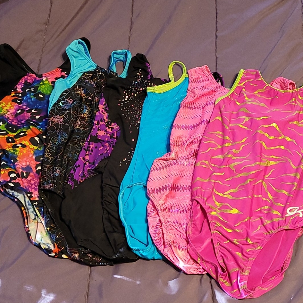 Lot of gk gymnastic leotards (6)